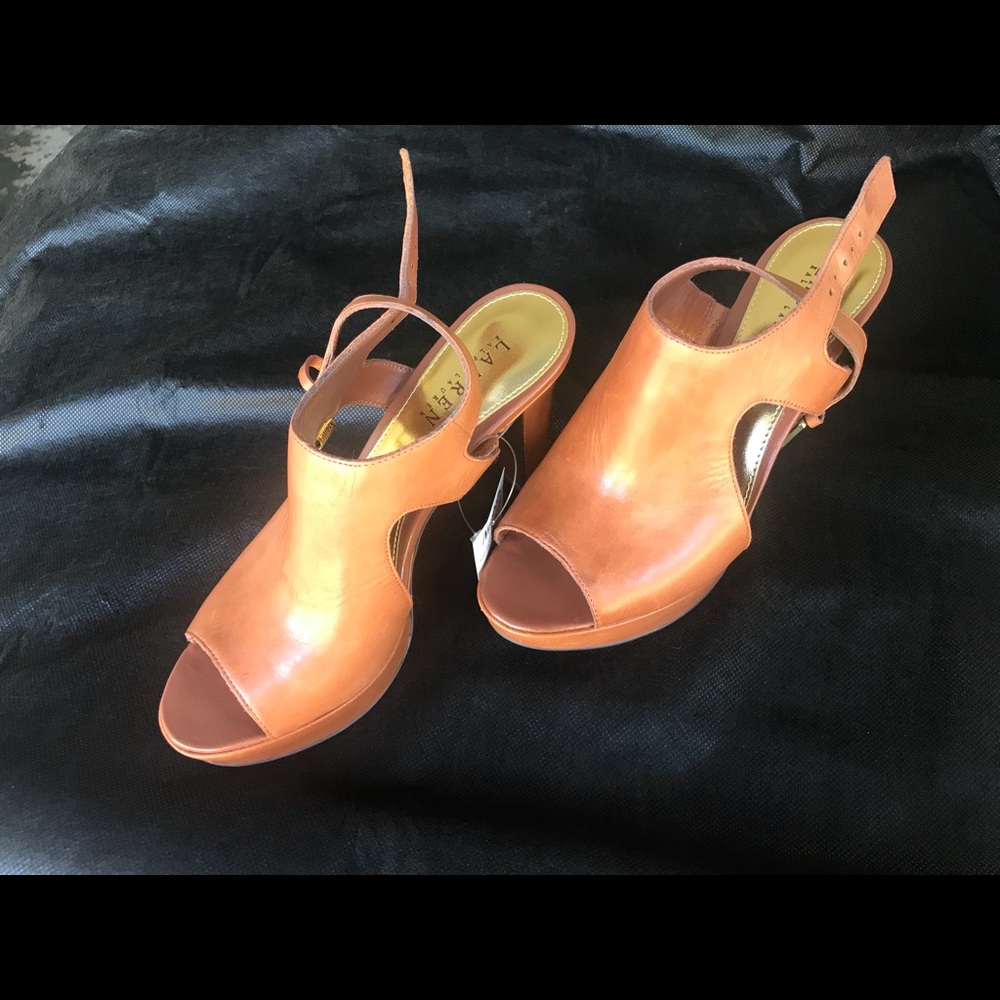 Open toe clogs. Never worn